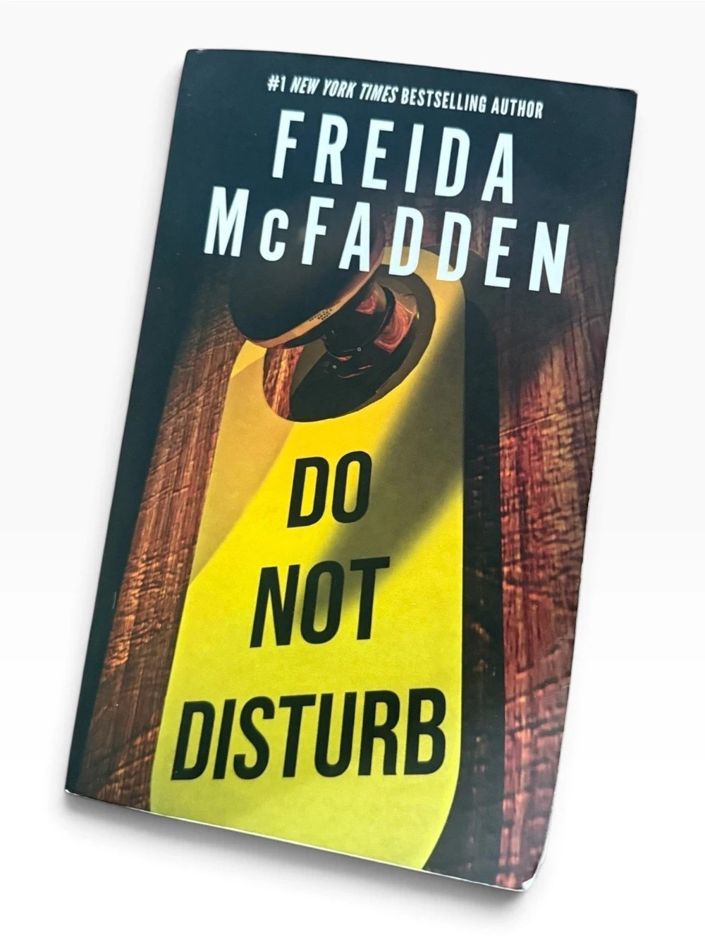 Poisoned Pen Press Do Not Disturb by Freida McFadden Paperback Yellow & Black